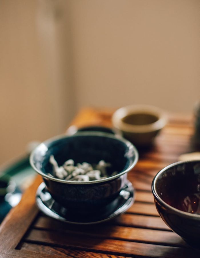 Morning ritual with herbal support products on a wooden table